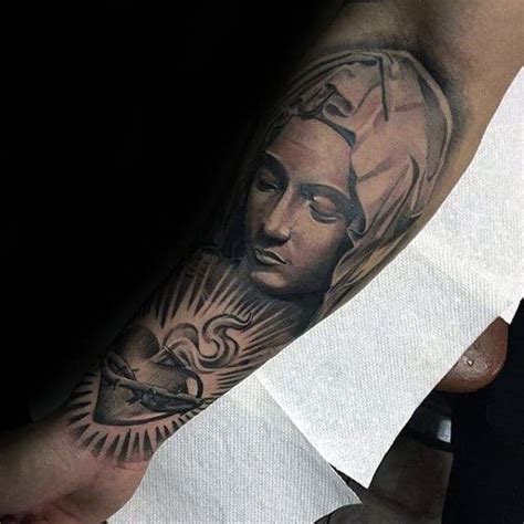 virgin mary meaning tattoo|virgin mary forearm tattoo men.